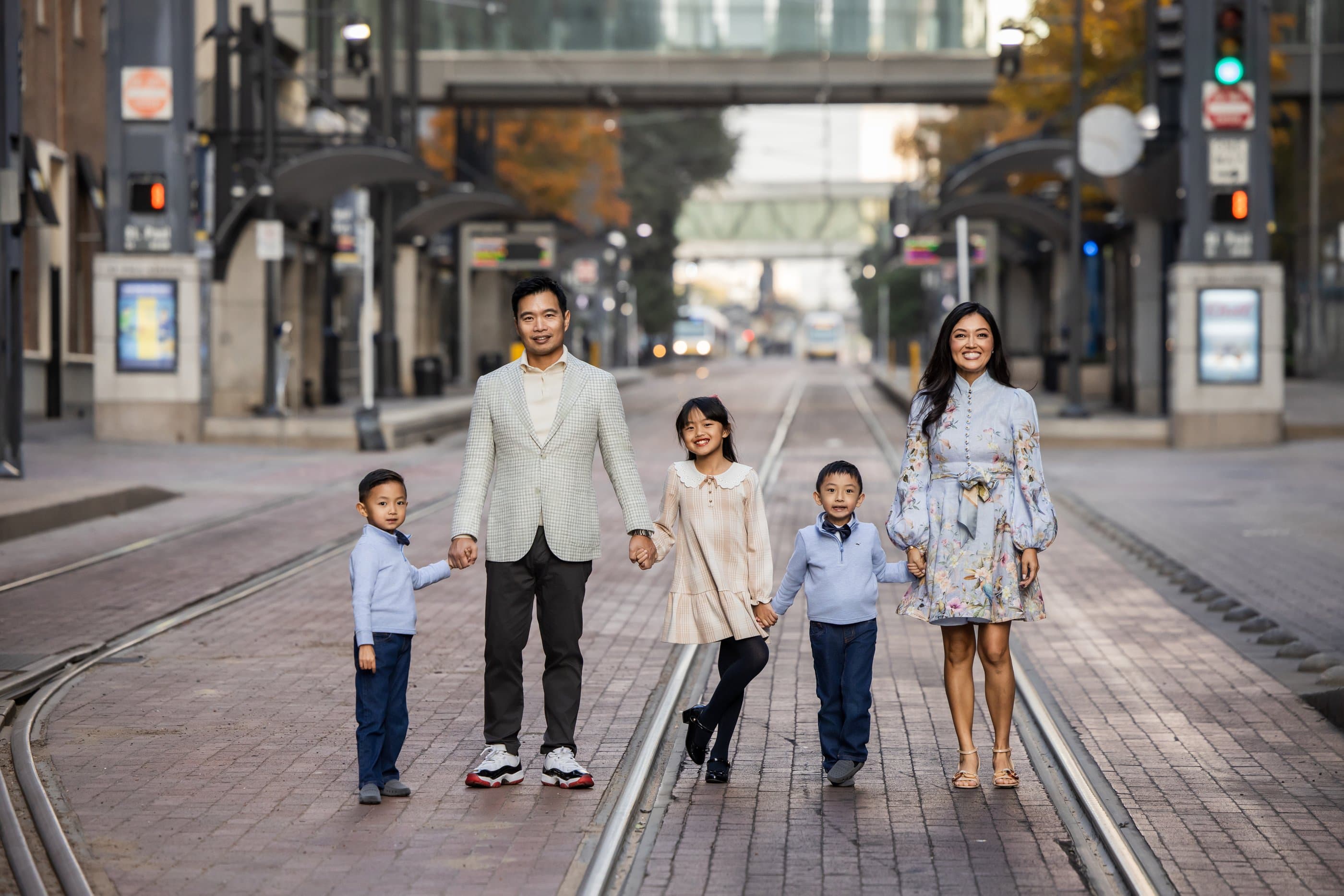 The Lam family walking together in downtown Dallas